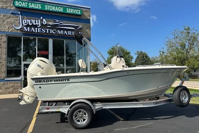 Slide: The Image of 2026 Grady-White Fisherman 180 boat on trailer outside Jerry's Majestic Marine. - 1