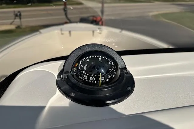 Slide: The Image of Compass on 2026 Grady-White Fisherman 180 boat, showing east direction. - 10