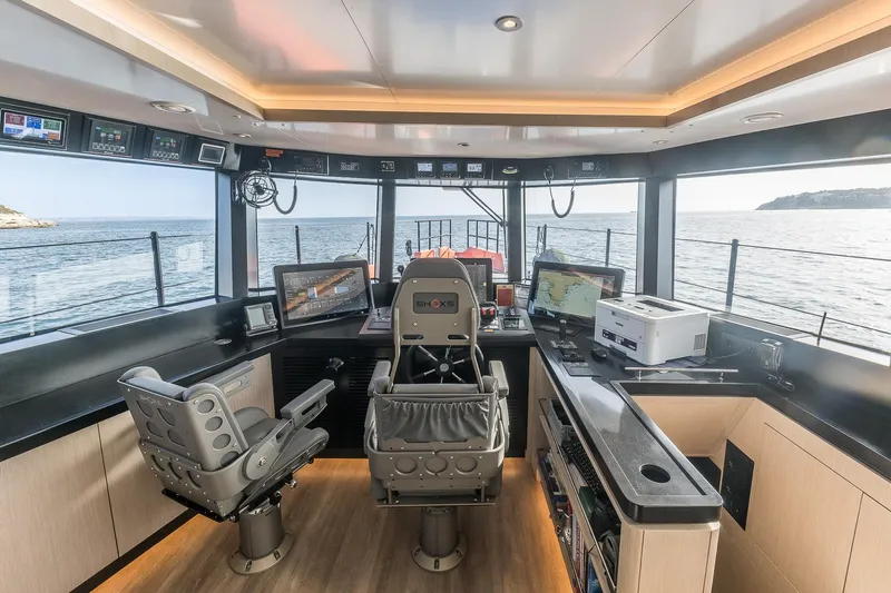 Slide: The Image of Modern helm of 2023 Naval Yachts XPM 78 with advanced navigation systems. - 12