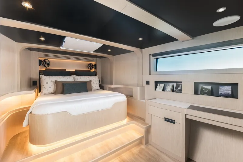 Slide: The Image of Luxurious bedroom interior of 2023 Naval Yachts XPM 78, featuring modern design and ambient lighting. - 13