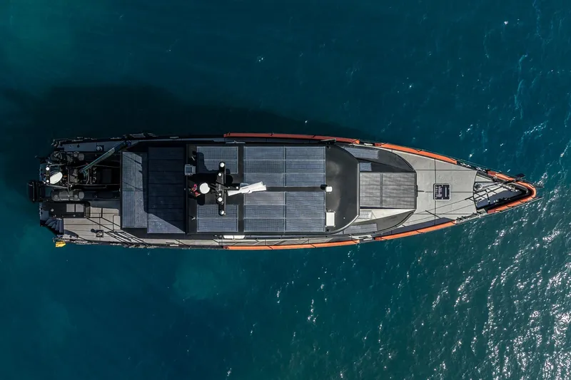 Slide: The Image of Aerial view of 2023 Naval Yachts XPM 78 on blue ocean water. - 21