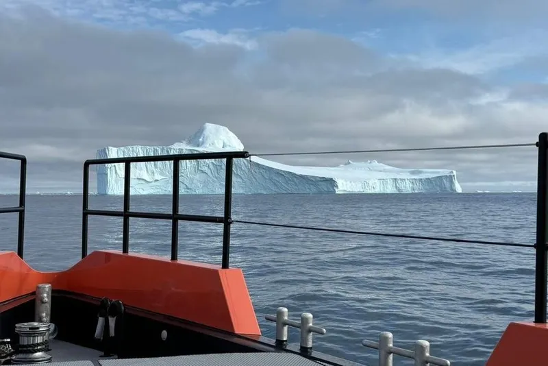 Slide: The Image of Naval Yachts XPM 78 (2023) views massive iceberg on open sea. - 37