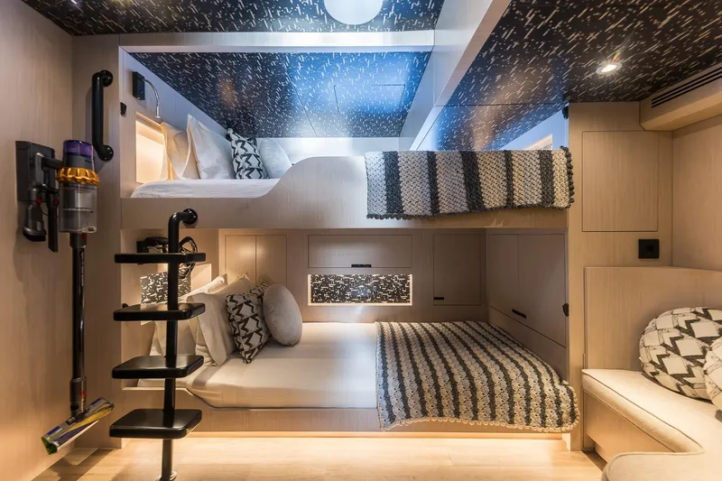 Slide: The Image of Luxurious interior of 2023 Naval Yachts XPM 78 with modern bunk beds and stylish decor. - 18