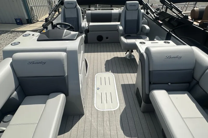 Slide: The Image of 2025 Bentley Pontoons 223 Elite Swingback interior with luxurious seating and modern design. - 5