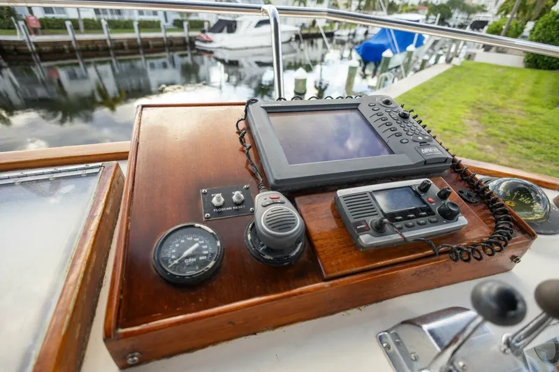 Slide: The Image of Control panel of a 1985 Grand Banks 42 Classic boat with navigation equipment. - 30