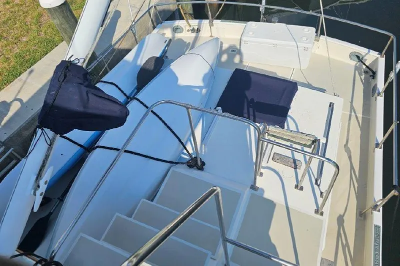 Slide: The Image of 1985 Grand Banks 42 Classic yacht deck with seating and storage. - 8
