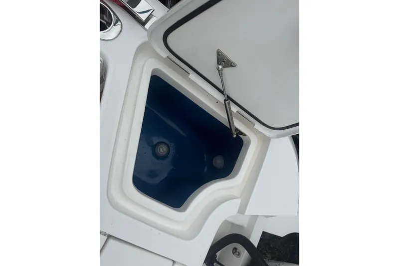 Slide: The Image of Triple Mercury Racing 450R outboard engines on a 2021 Intrepid 409 Valor boat. - 13