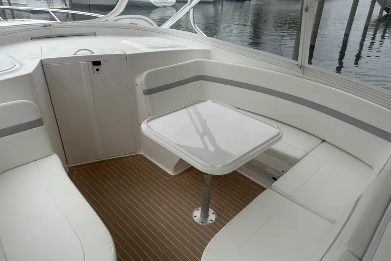 Slide: The Image of Open storage compartment on 2021 Intrepid 409 Valor boat. - 22