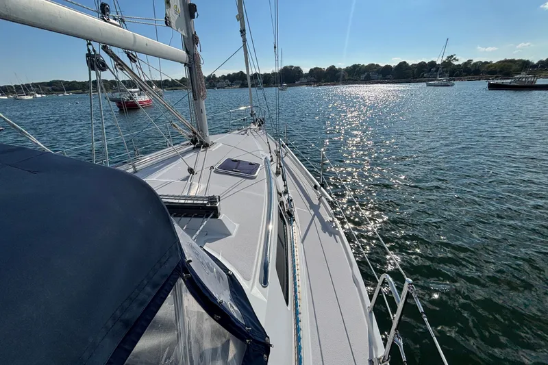 Slide: The Image of Sailboat Catalina 350 (2004) on calm water, sunny day, scenic view. - 26