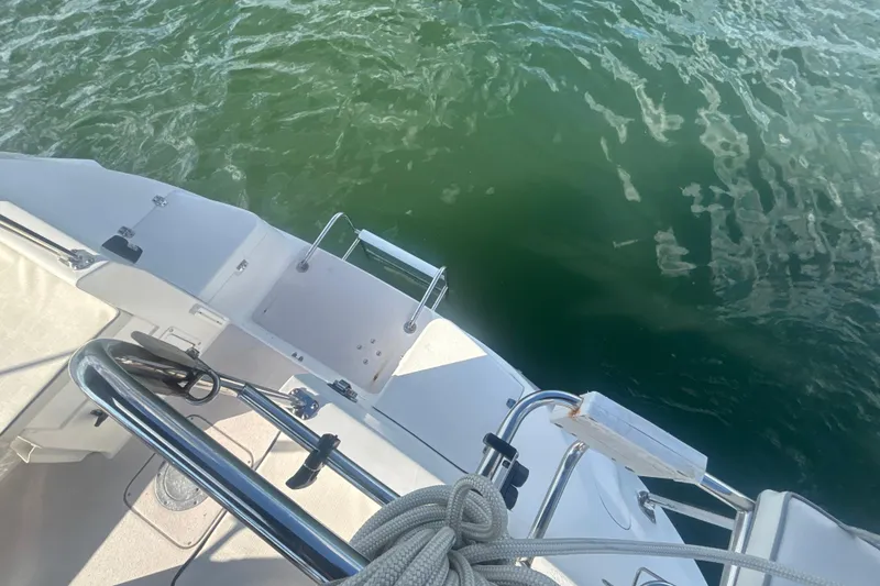 Slide: The Image of Catalina 350 sailboat deck, 2004 model, with water view and nautical equipment. - 32