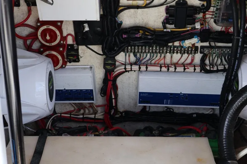 Slide: The Image of Electrical system of a 2008 Renegade 29CC boat, featuring wiring and control panels. - 11