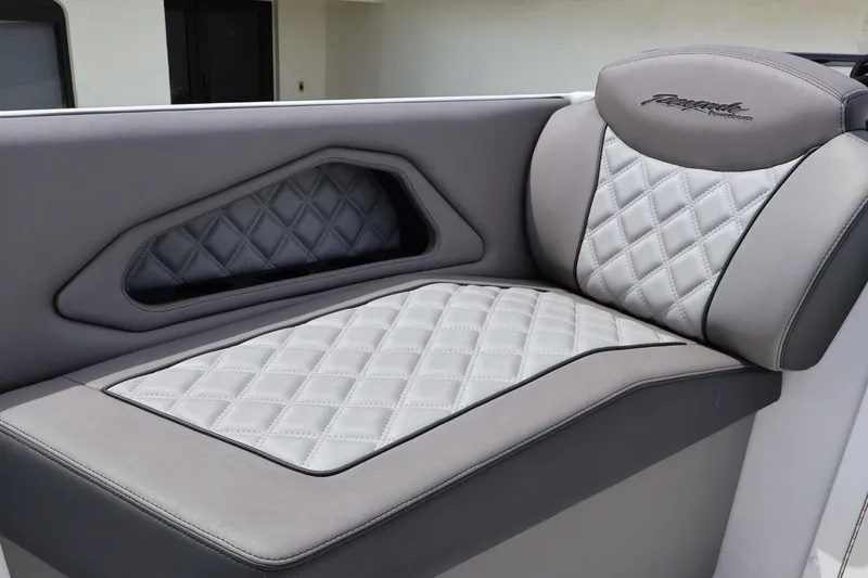 Slide: The Image of Luxurious seating on a 2008 Renegade 29CC boat, featuring diamond-stitched upholstery. - 4