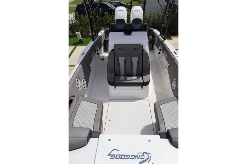 Slide: The Image of 2008 Renegade 29CC boat interior with gray seating and sleek design. - 5