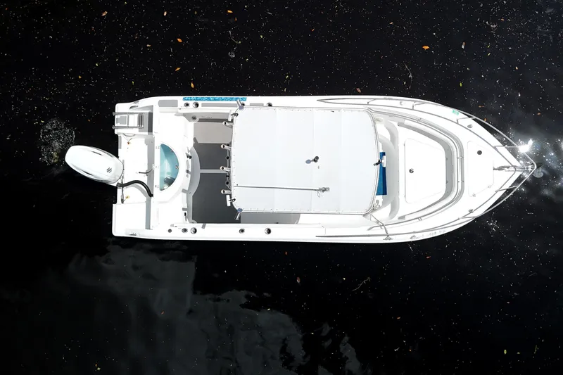 Slide: The Image of Aerial view of 2009 Sea Fox 230 Center Console boat on dark water. - 4