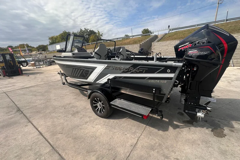 Slide: The Image of 2025 Starcraft Delta 188 DC Pro boat on trailer, featuring Mercury Pro XS engine. - 1