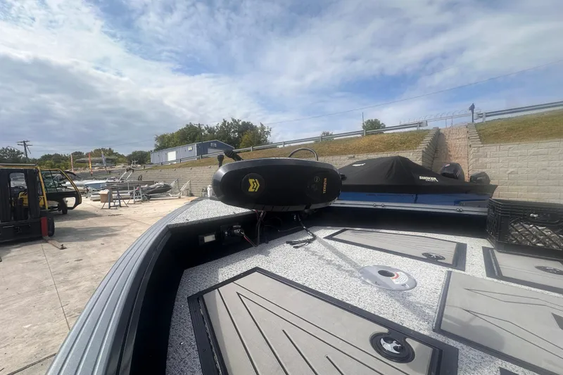 Slide: The Image of 2025 Starcraft Delta 188 DC Pro boat on a dock, featuring a Minn Kota trolling motor. - 17