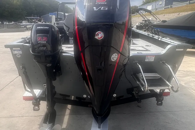 Slide: The Image of 2025 Starcraft Delta 188 DC Pro boat with Mercury 9.9 Pro and V6 engines. - 3