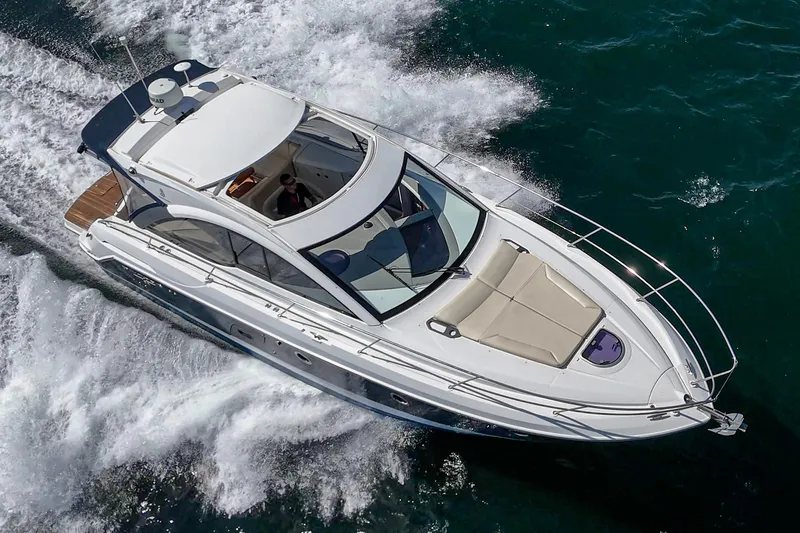 Slide: The Image of 2014 Beneteau Gran Turismo 38 cruising on open water, aerial view. - 14