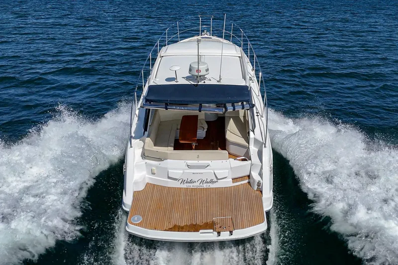 Slide: The Image of 2014 Beneteau Gran Turismo 38 yacht cruising on open water, rear view. - 20