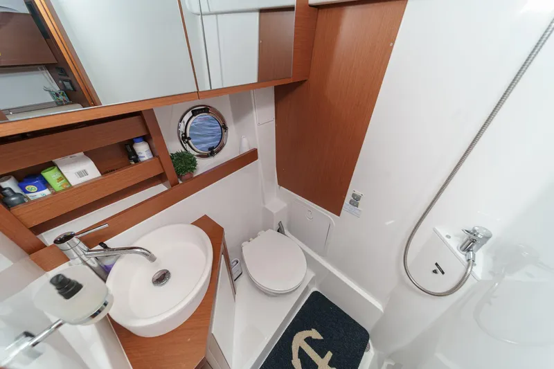 Slide: The Image of Bathroom interior of 2014 Beneteau Gran Turismo 38 yacht, featuring sink and shower. - 51