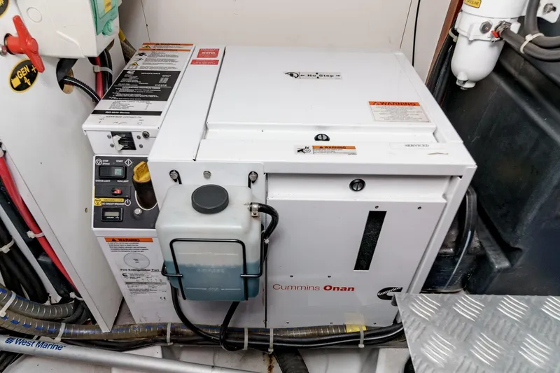Slide: The Image of Cummins Onan generator in 2014 Beneteau Gran Turismo 38 engine room. - 53