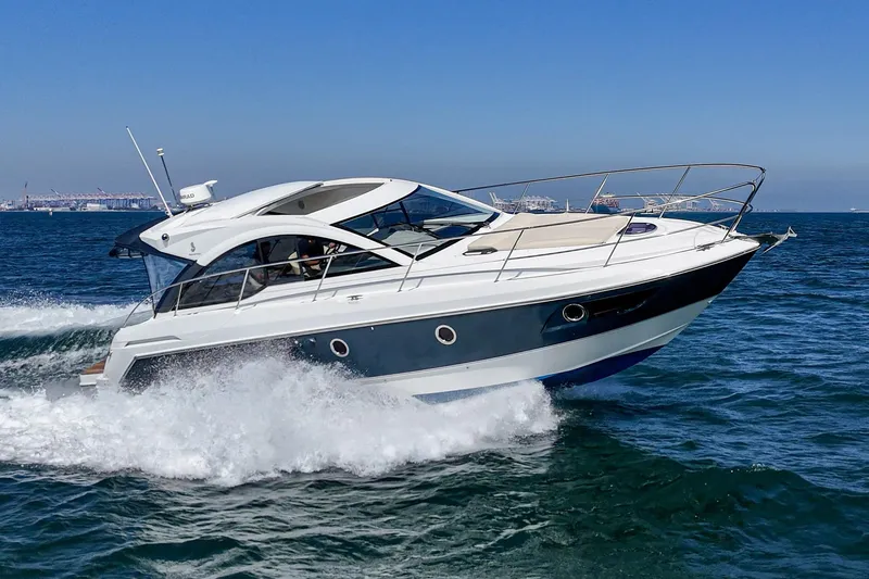 Slide: The Image of 2014 Beneteau Gran Turismo 38 yacht cruising on open water. - 7
