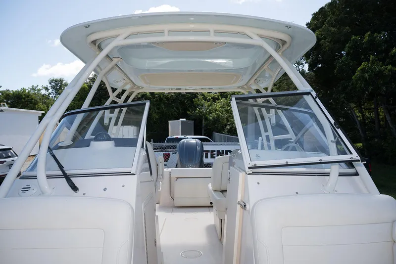 Slide: The Image of 2023 Grady-White Freedom 235 boat interior with open cockpit and seating. - 23