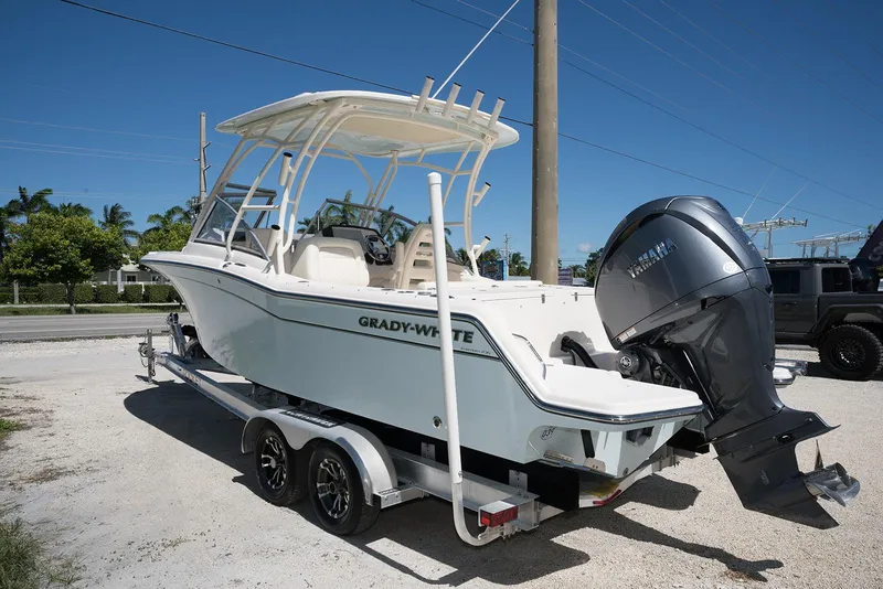 Slide: The Image of 2023 Grady-White Freedom 235 boat on trailer with Yamaha outboard motor. - 4