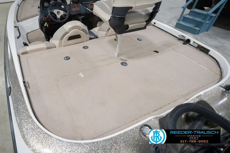 Slide: The Image of Interior view of a 2003 Nitro 911 CDC boat, showcasing the steering console. - 14