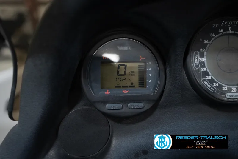 Slide: The Image of Dashboard of a 2003 Nitro 911 CDC with Yamaha speedometer displaying 84.4 mph. - 31