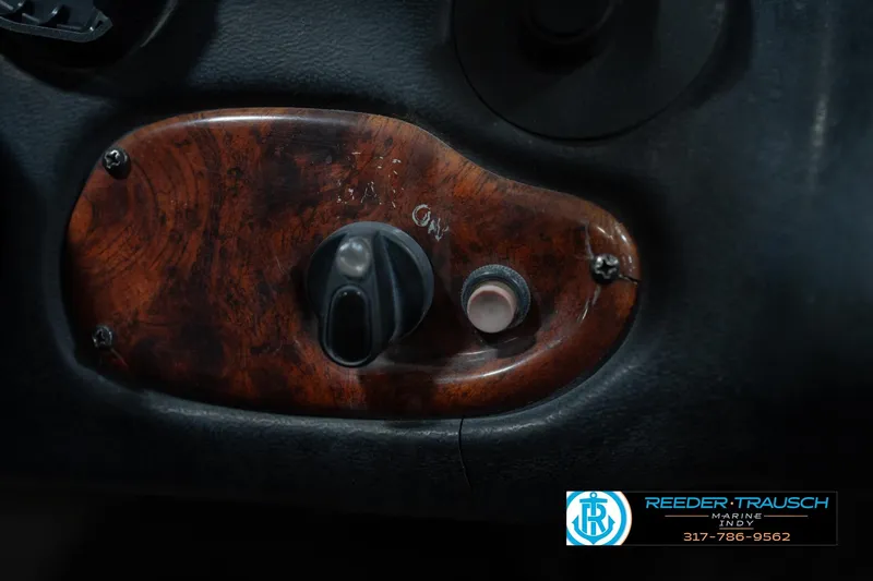 Slide: The Image of Interior of a 2003 Nitro 911 CDC boat with control lever and wiring. - 35