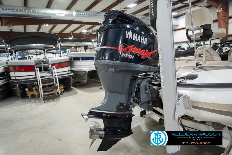 Slide: The Image of Close-up of a 2003 Nitro 911 CDC boat propeller in a showroom. - 47