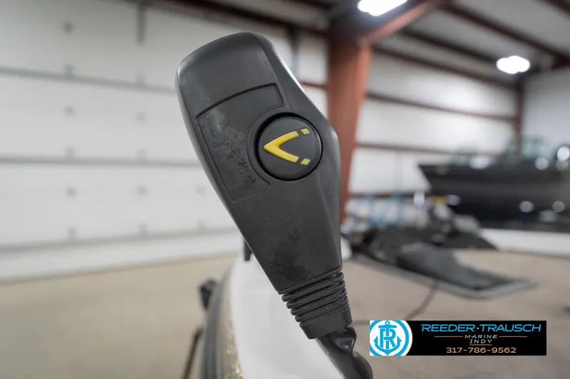 Slide: The Image of 2003 Nitro 911 CDC boat trailer in a showroom, featuring Reeder Trausch Marine logo. - 53
