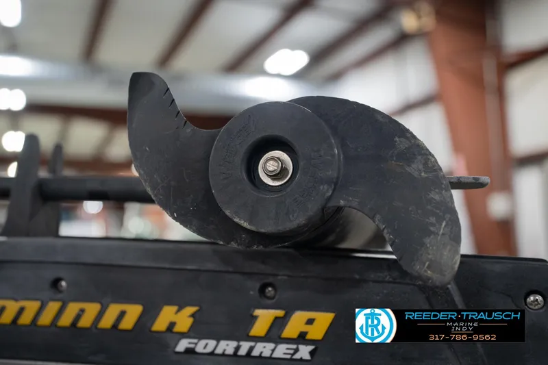 Slide: The Image of 2003 Nitro 911 CDC boat on trailer in indoor storage facility. - 54