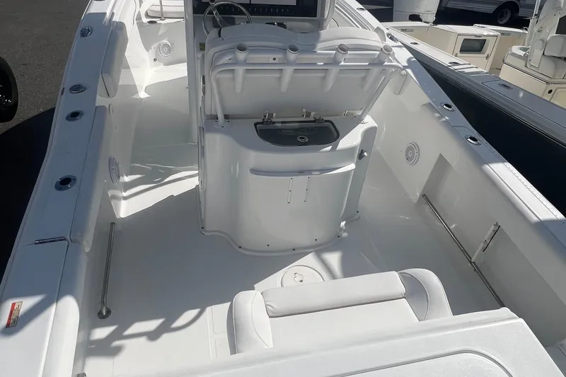 Slide: The Image of 2019 Sea Hunt Gamefish 25 boat interior with seating and console. - 4