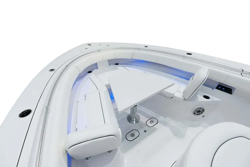 Slide: The Image of Manufacturer Provided Image: 2025 Sportsman Open 352 Center Console boat interior with seating and table. - 6