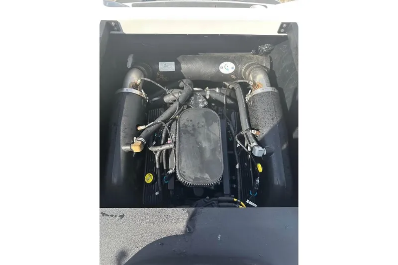 Slide: The Image of Engine compartment of a 2012 Axis A20 boat, showing detailed components and connections. - 9