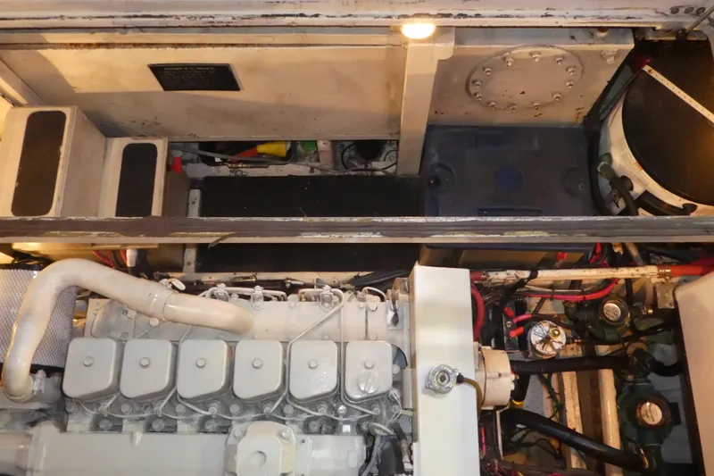 Slide: The Image of Engine room of a 1979 Hiptimco 40' Trawler with visible machinery and components. - 35