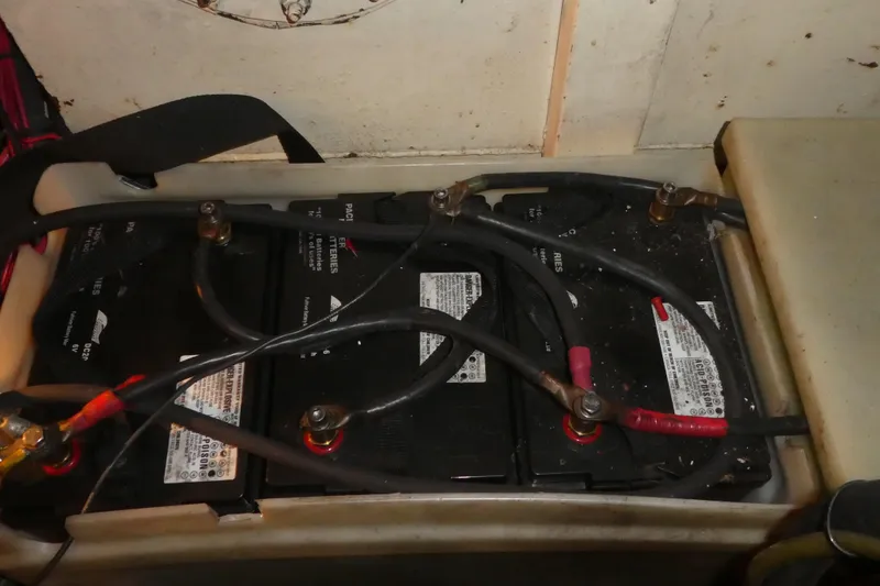 Slide: The Image of Battery compartment of a 1979 Hiptimco 40' Trawler with connected cables. - 40