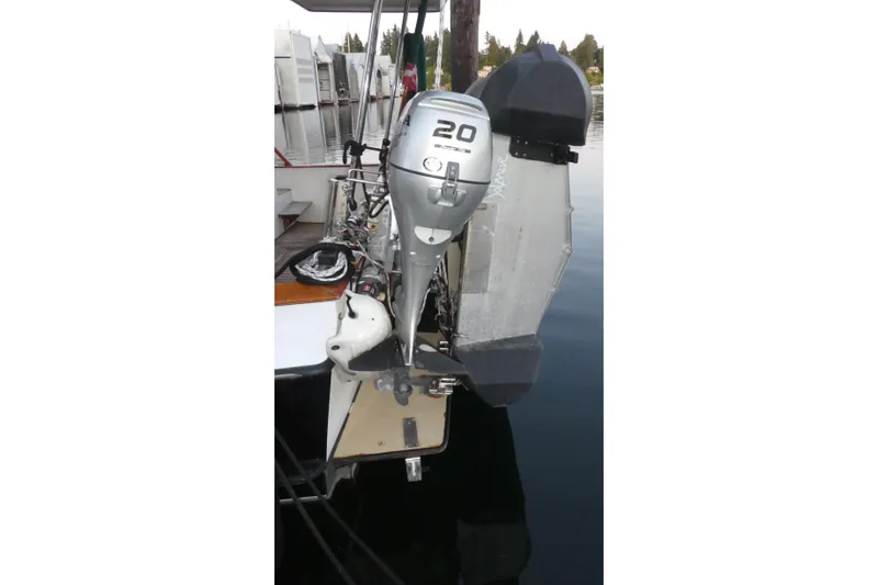 Slide: The Image of Outboard motor on 1979 Hiptimco 40' Trawler, docked at marina. - 46