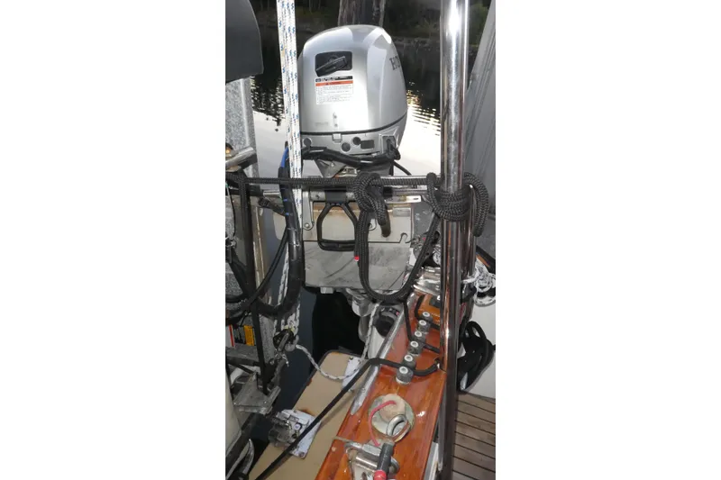 Slide: The Image of 1979 Hiptimco 40' Trawler with outboard motor and deck details. - 47