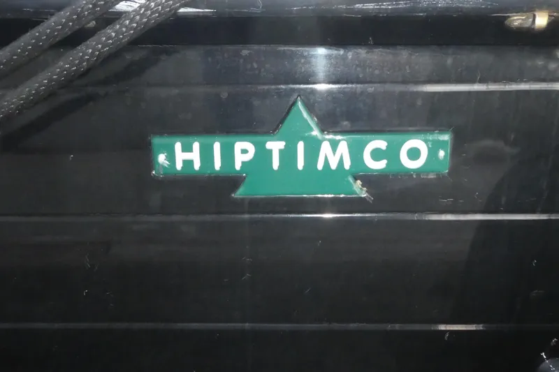 Slide: The Image of Green Hiptimco logo on a 1979 40' Trawler boat. - 53