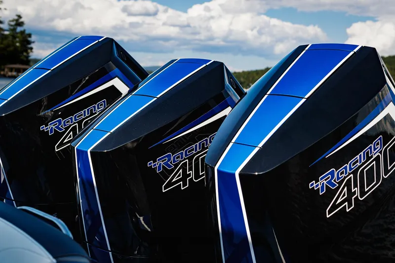 Slide: The Image of Triple Mercury Racing 400 outboard engines on a 2025 Nor-Tech 340 Sport Center Console boat. - 26