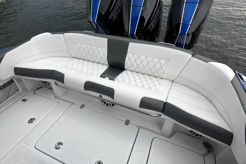 Slide: The Image of 2025 Nor-Tech 340 Sport Center Console with luxurious seating and powerful engines. - 30