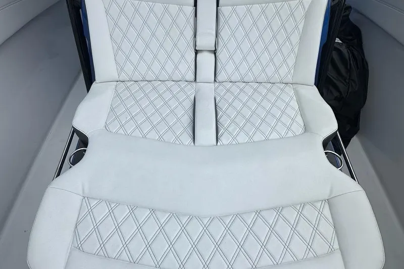 Slide: The Image of Luxurious seating on 2025 Nor-Tech 340 Sport Center Console with diamond stitching design. - 32