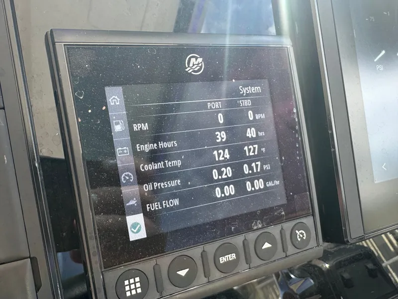 Slide: The Image of Display screen of 2025 Aquila 36 Sport showing engine metrics and system status. - 27