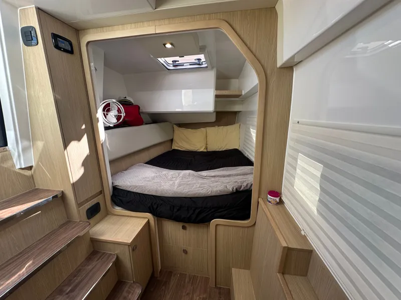 Slide: The Image of Interior cabin of 2025 Aquila 36 Sport yacht with cozy bed and modern design. - 31