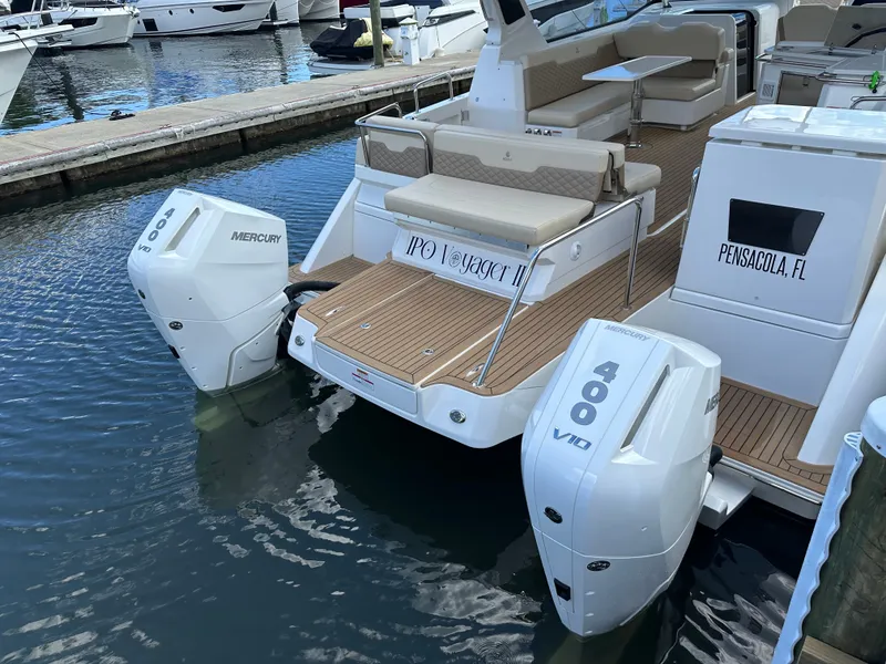 Slide: The Image of Aquila 36 Sport 2025 boat with twin Mercury 400 engines docked in Pensacola, FL. - 8