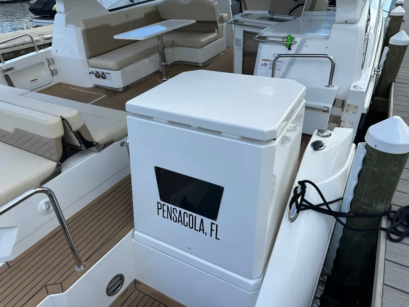 Slide: The Image of 2025 Aquila 36 Sport yacht interior with seating, docked in Pensacola, FL. - 9