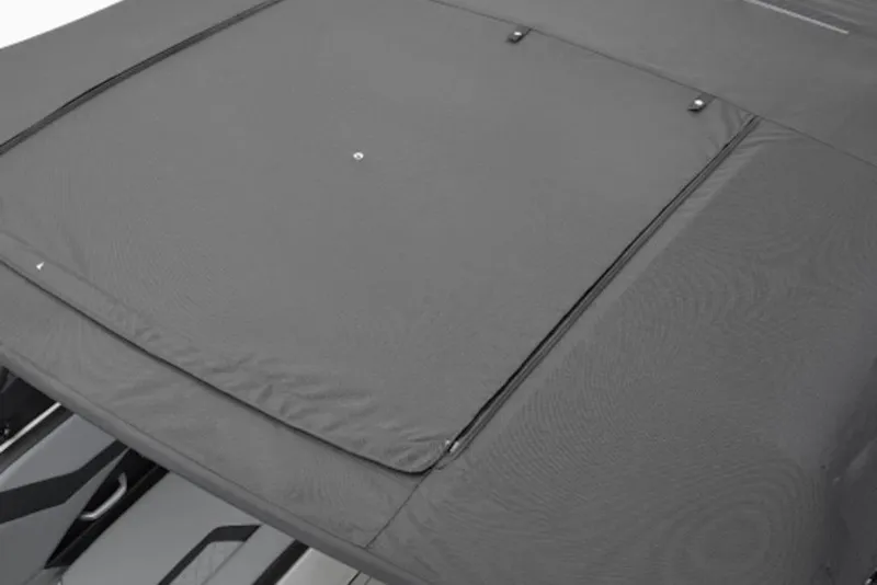 Slide: The Image of 2026 Yamaha Boats 255XE with a sleek, protective cover. - 5